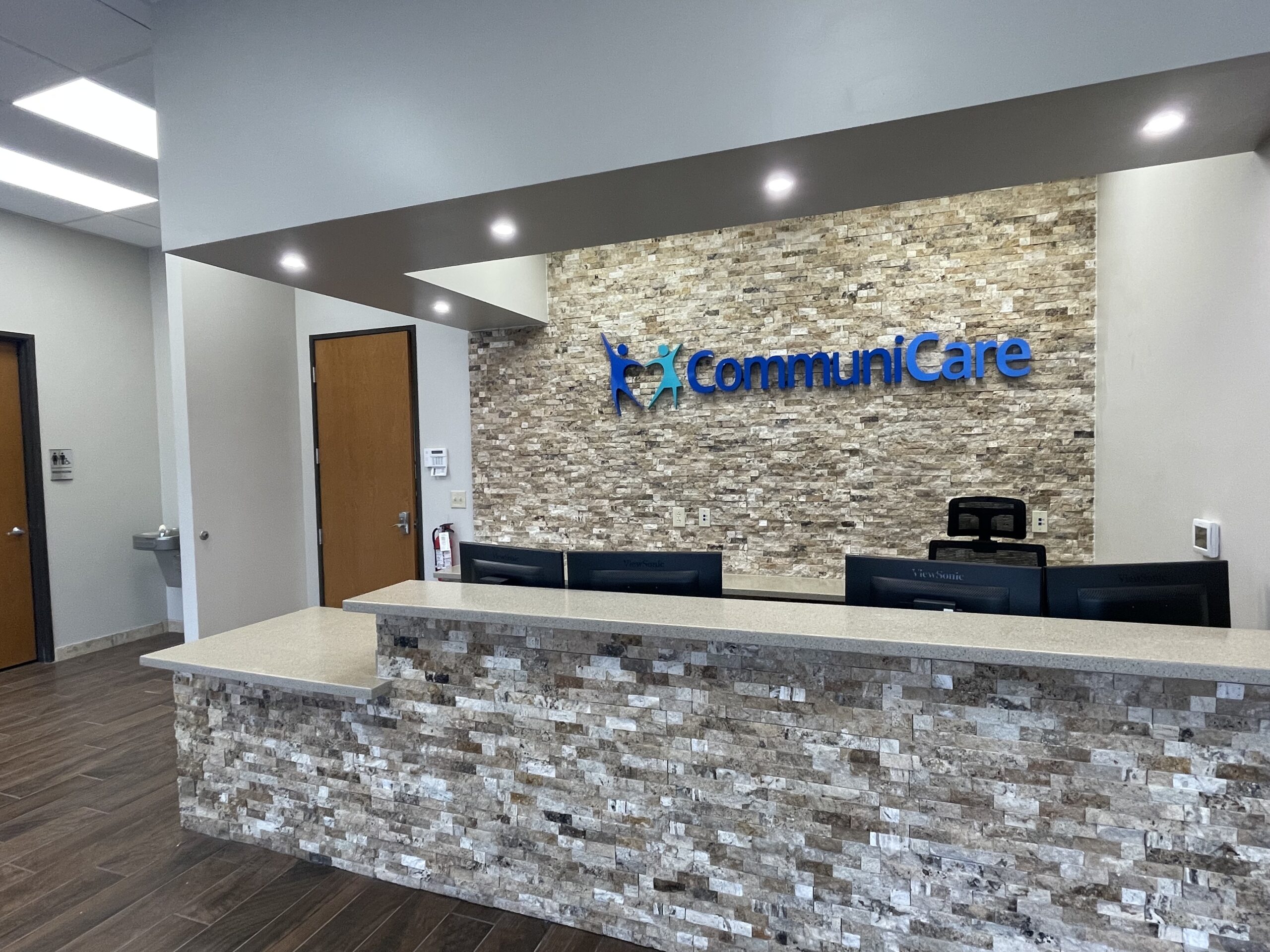 Front desk of the large waiting room inside CommuniCare's Alamo Ranch Campus clinic