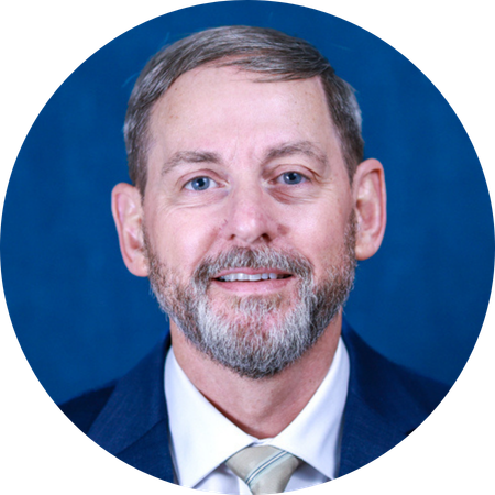 Circle frame headshot of Dr. Michael Rosedale